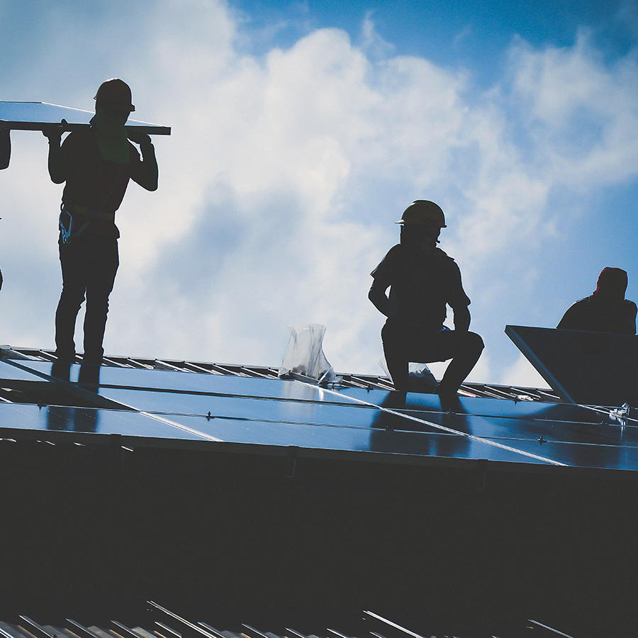 Commercial Roofing Contractors Installing Solar Panels